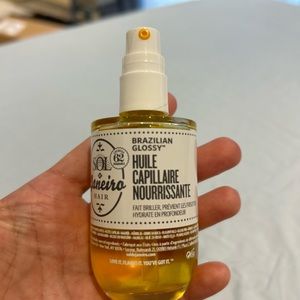 BRAZILIAN GLOSSY™ NOURISHING HAIR OIL Sol De Janeiro Opened used once.